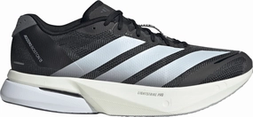 adidas Adizero Boston 13 Mens Running Shoes - Black running on a gravel road