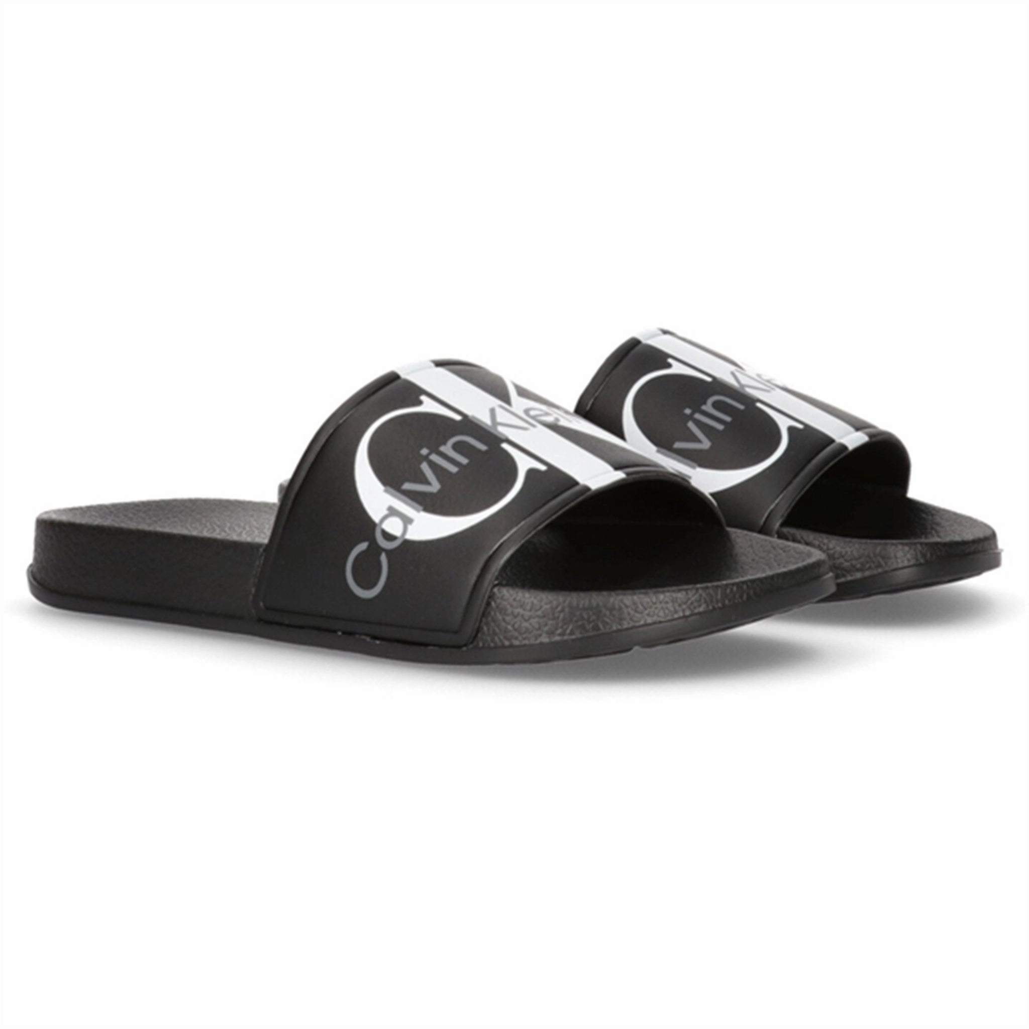 Sporty Footwear for Vacation Calvin Klein Logo Pool Slide Black