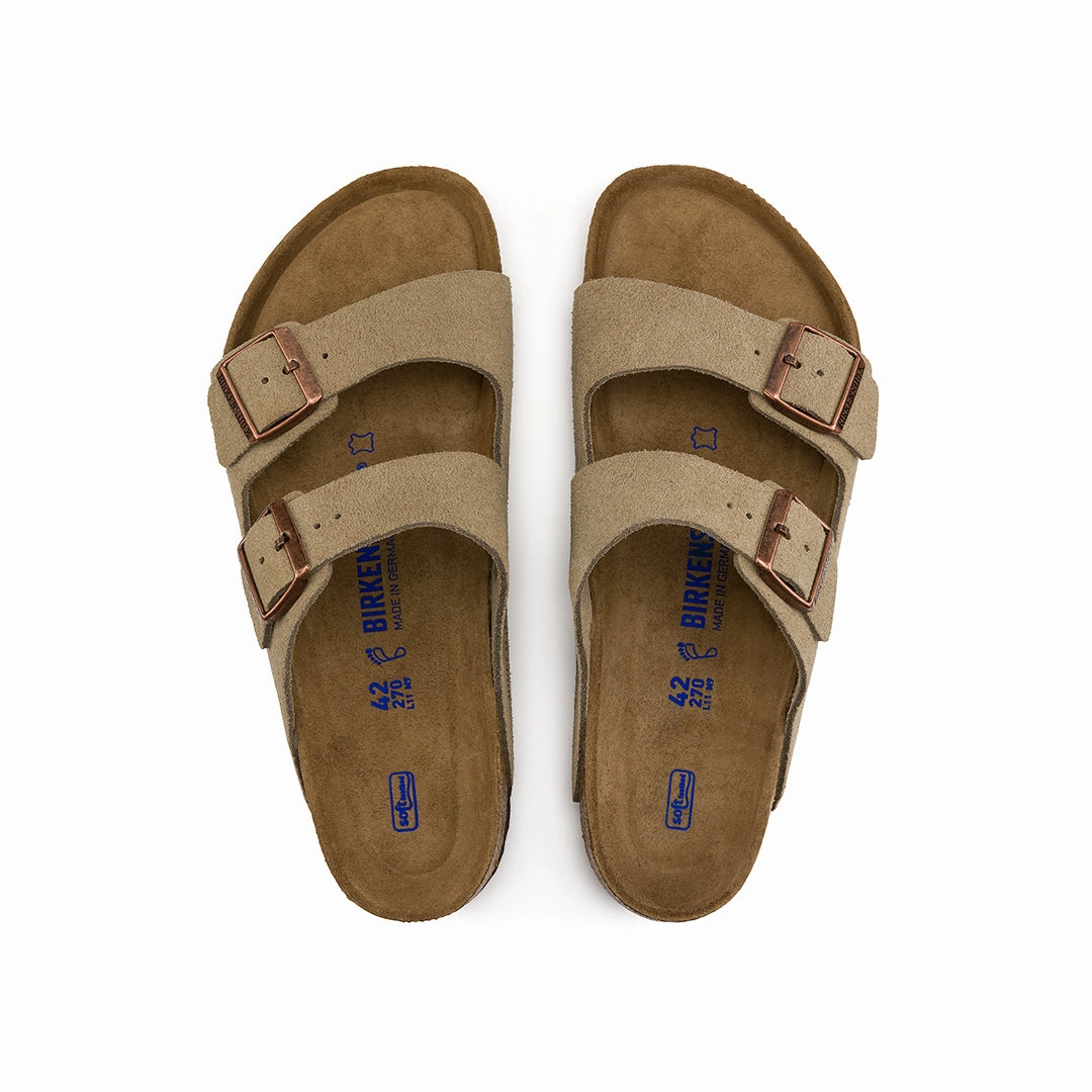 Birkenstock Unisex Arizona Sandal running in a park trail