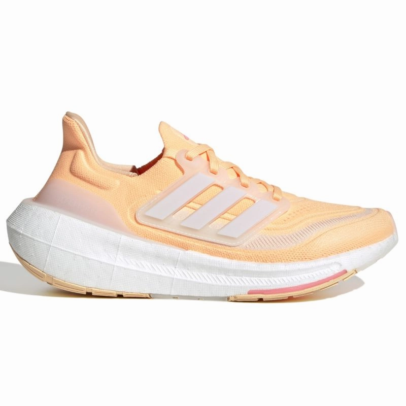 Adidas Ultraboost Light Womens Running Shoes running in a beach area shoes