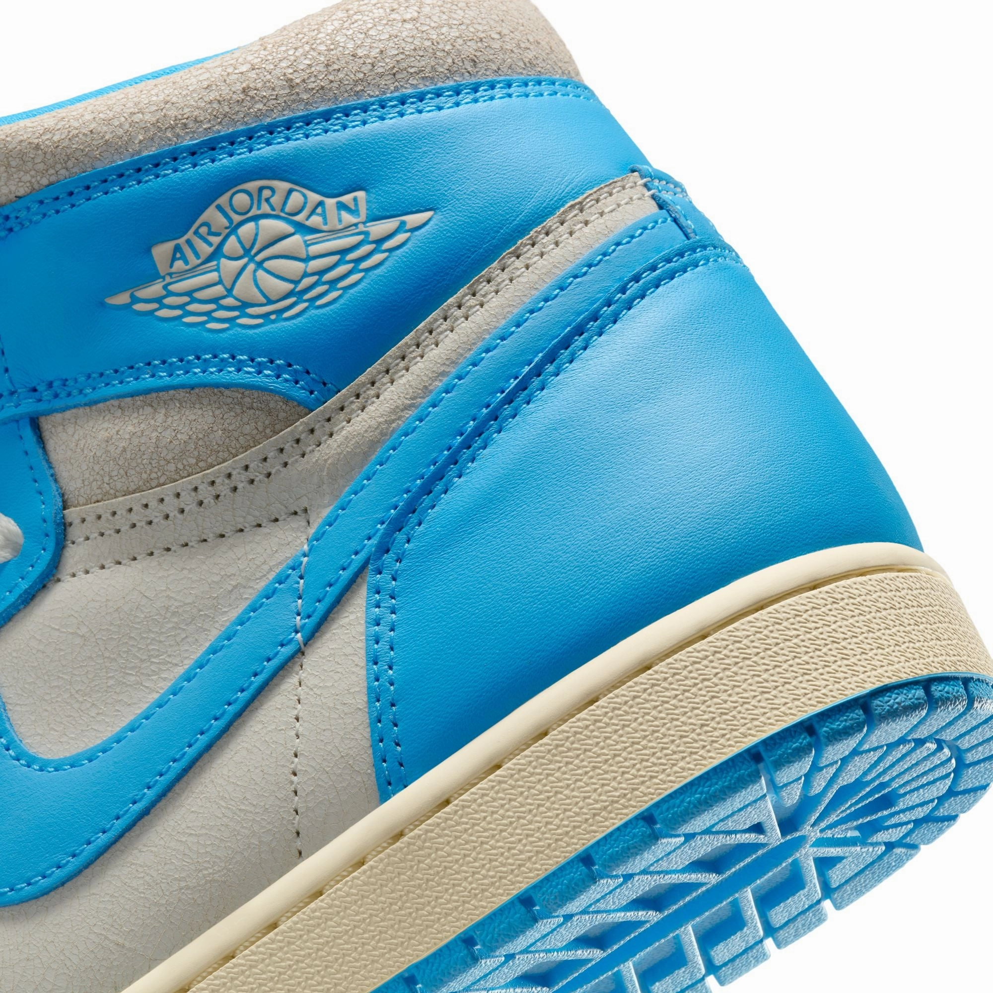 Air Jordan 1 Mens Retro High OG "UNC Reimagined" Shoes running in an urban area shoes Perimeter Guard